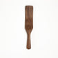 Walnut wooden spatula on a white background